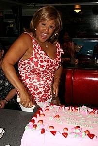 Photo Op - Darlene Love Birthday at Ellen's Stardust Diner - Darlene Love (cuts cake)