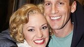 Cable-vision: Co-star Andrew Samonsky gives Laura Osnes and welcoming squeeze.