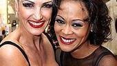 The razzle dazzle smiles of Amra-Faye Wright and Robin Givens. 