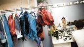 Inside, Sherrie&rsquo;s eye-catching wardrobe pieces (think red and royal blue) are racked and ready.