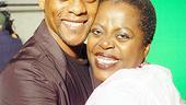 ...this time, he shares the exhausting and challenging role with Kevin Mambo, seen here putting the squeeze on onstage mother Lillias White.