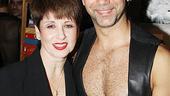 Longtime Chicago music director Leslie Stifelman offers a celebratory hug to Shawn Emamjomeh.