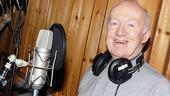 Jim Norton, who plays the title character, looks pleased as punch to get behind the microphone.
