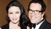 A luminous Catherine Zeta-Jones poses with Michael Mayer, who guided the evening&rsquo;s entertainment.
