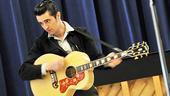 We recognize that pompadour! Eddie Clendening channels Elvis Presley.