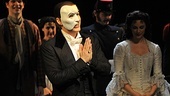 Hugh Panaro makes a “phabulous” speech while Trista Moldovan and the cast look on.