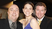 After the cheers die down, Sutton gets a hug from her accompanists, guitarist Kevin Kuhn and pianist Michael Rafter. 