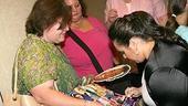 With the crowd of new Hairspray buffs,Nikki Blonsky gets busy with the autographs.